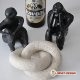 'amitié qui liait mes grand-parents paternels avec un ouvrier portugais, tailleur de pierre de son état, venu rénover la bâtiment ecclésiastique du coin, et à qui ils ont offert le gîte et le couvert. Reproductions des statuettes de Cernavodă (Roumanie) datant de l'époque néolithique. / Jarring note (= couac in french, pronounced like Kwak/quack). Chalky rings sculpted in the round cut from solid. Symbol of the friendship between my grand-parents (father's side) and a portuguese worker, stone carver working on the repair of the church near by, to whom they offered board and lodging. Reproduction of Cernavodă figures (Romania) dating from neolithic and known as "the thinker". Le couac. Anneaux de calcaire en ronde-bosse, taillés dans la masse. Symbole de l'amitié qui liait mes grand-parents paternels avec un ouvrier portugais, tailleur de pierre de son état, venu rénover la bâtiment ecclésiastique du coin, et à qui ils ont offert le gîte et le couvert. Reproductions des statuettes de Cernavodă (Roumanie) datant de l'époque néolithique. / Jarring note (= couac in french, pronounced like Kwak/quack). Chalky rings sculpted in the round cut from solid. Symbol of the friendship between my grand-parents (father's side) and a portuguese worker, stone carver working on the repair of the church near by, to whom they offered board and lodging. Reproduction of Cernavodă figures (Romania) dating from neolithic and known as "the thinker".